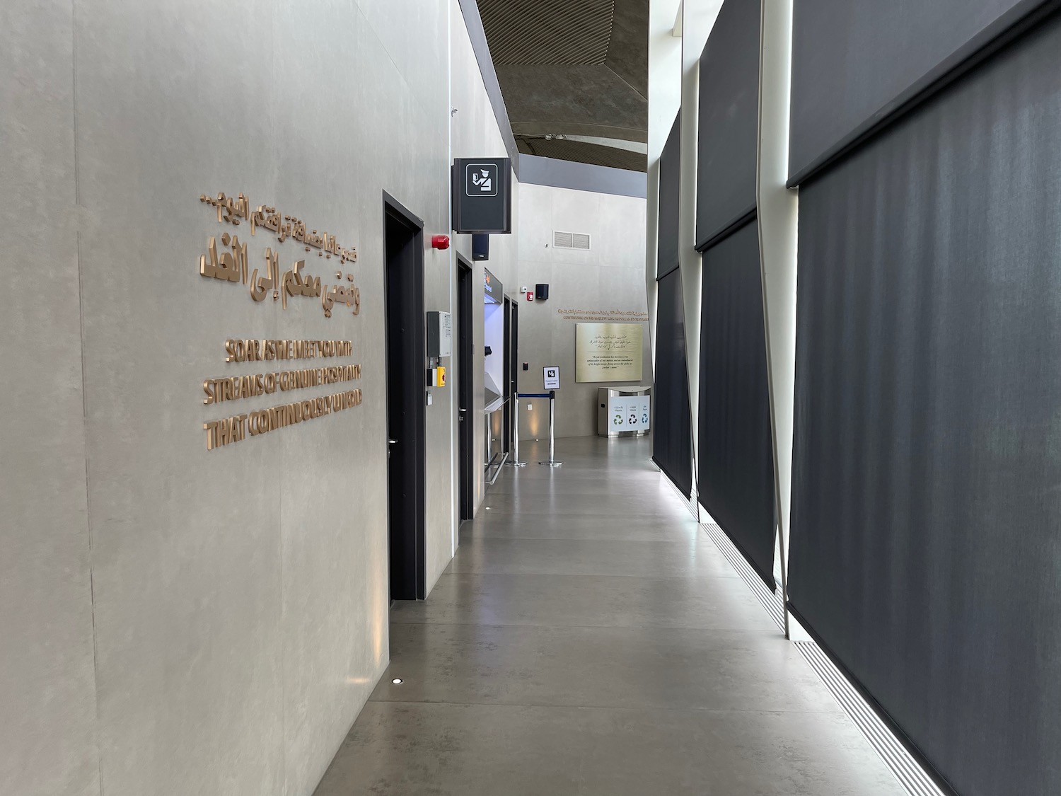 a hallway with a sign on the wall