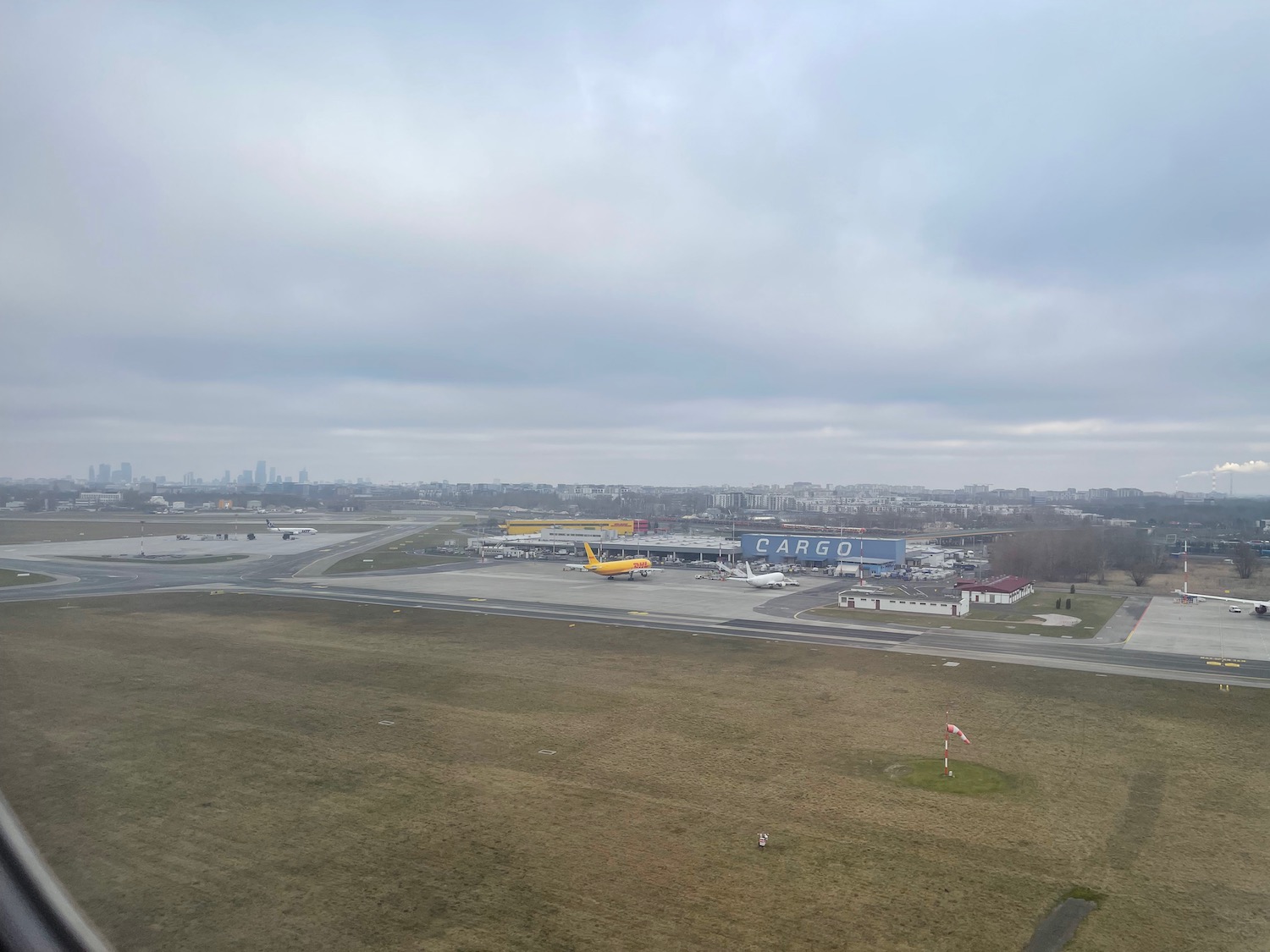 an airport with a plane on the runway