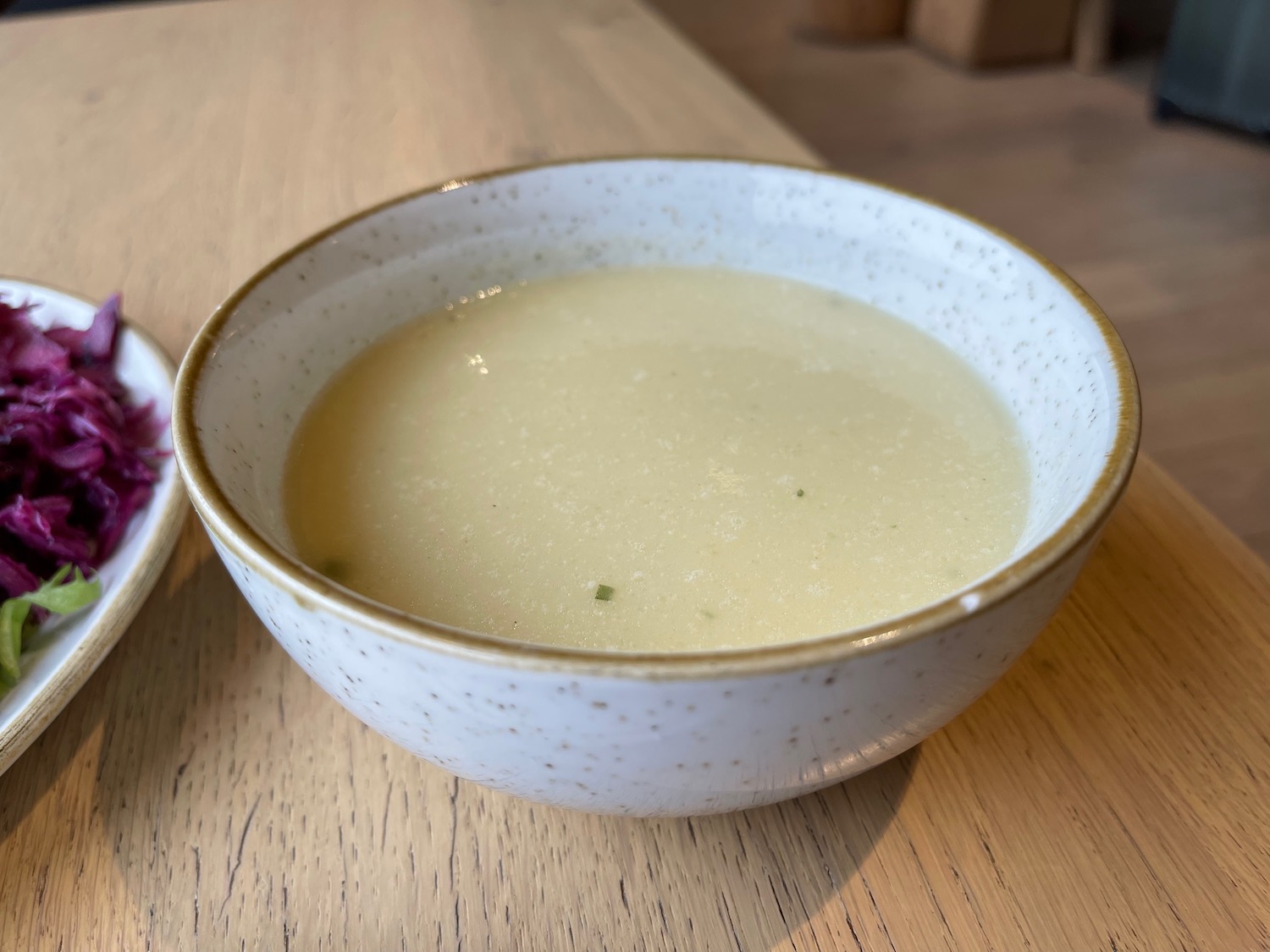 a bowl of soup on a table