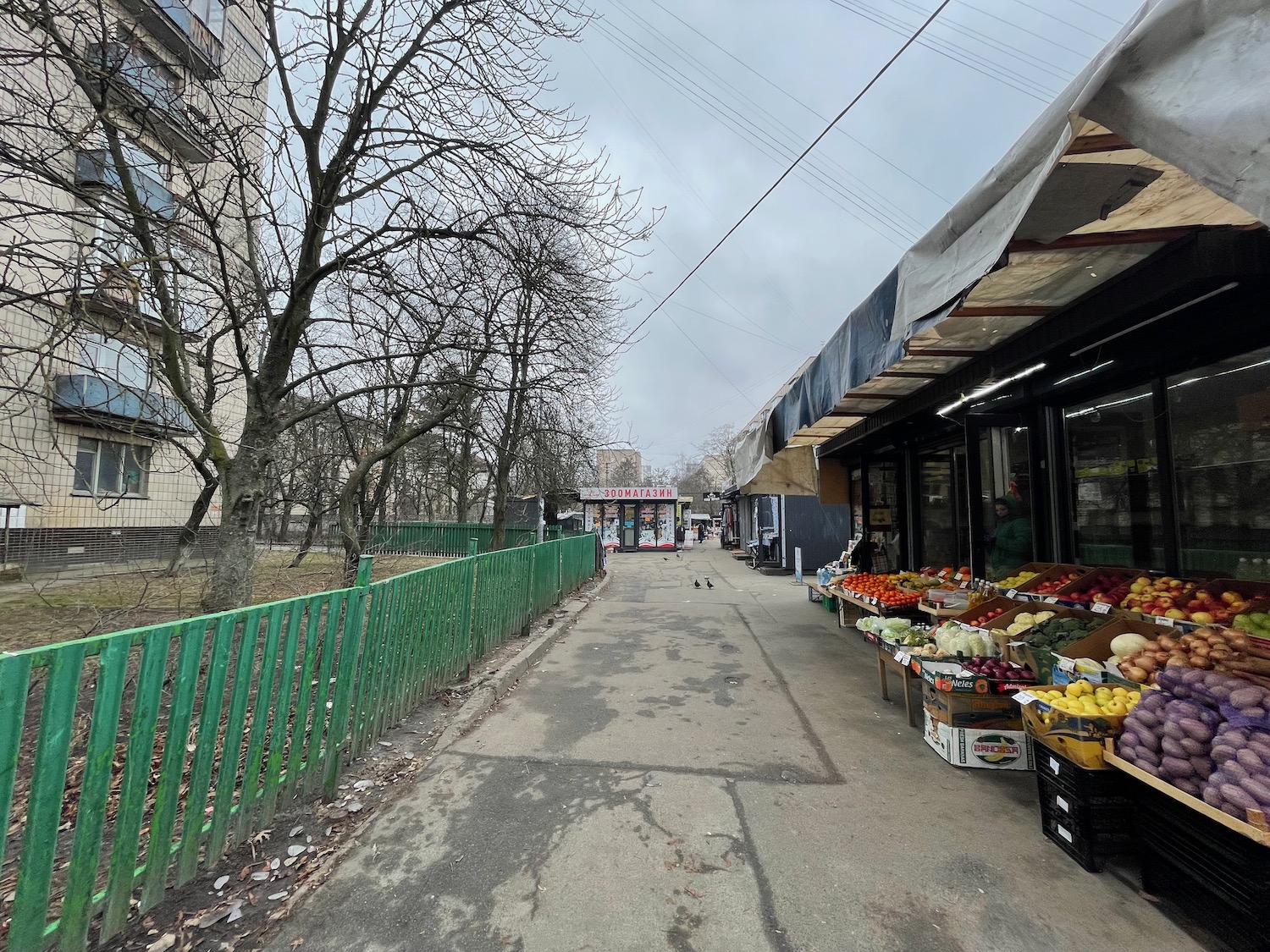 a street with a fruit stand