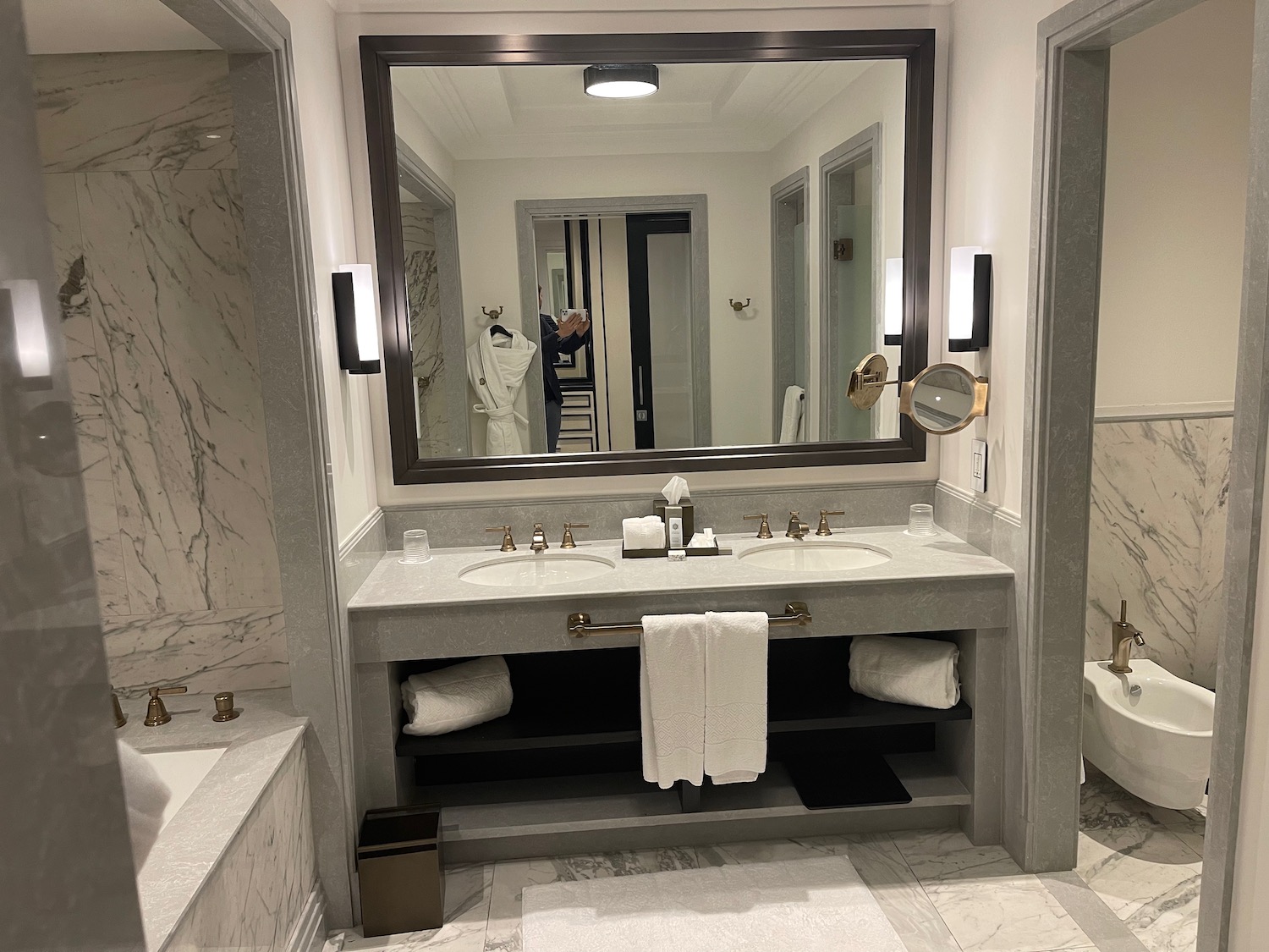 a bathroom with a large mirror