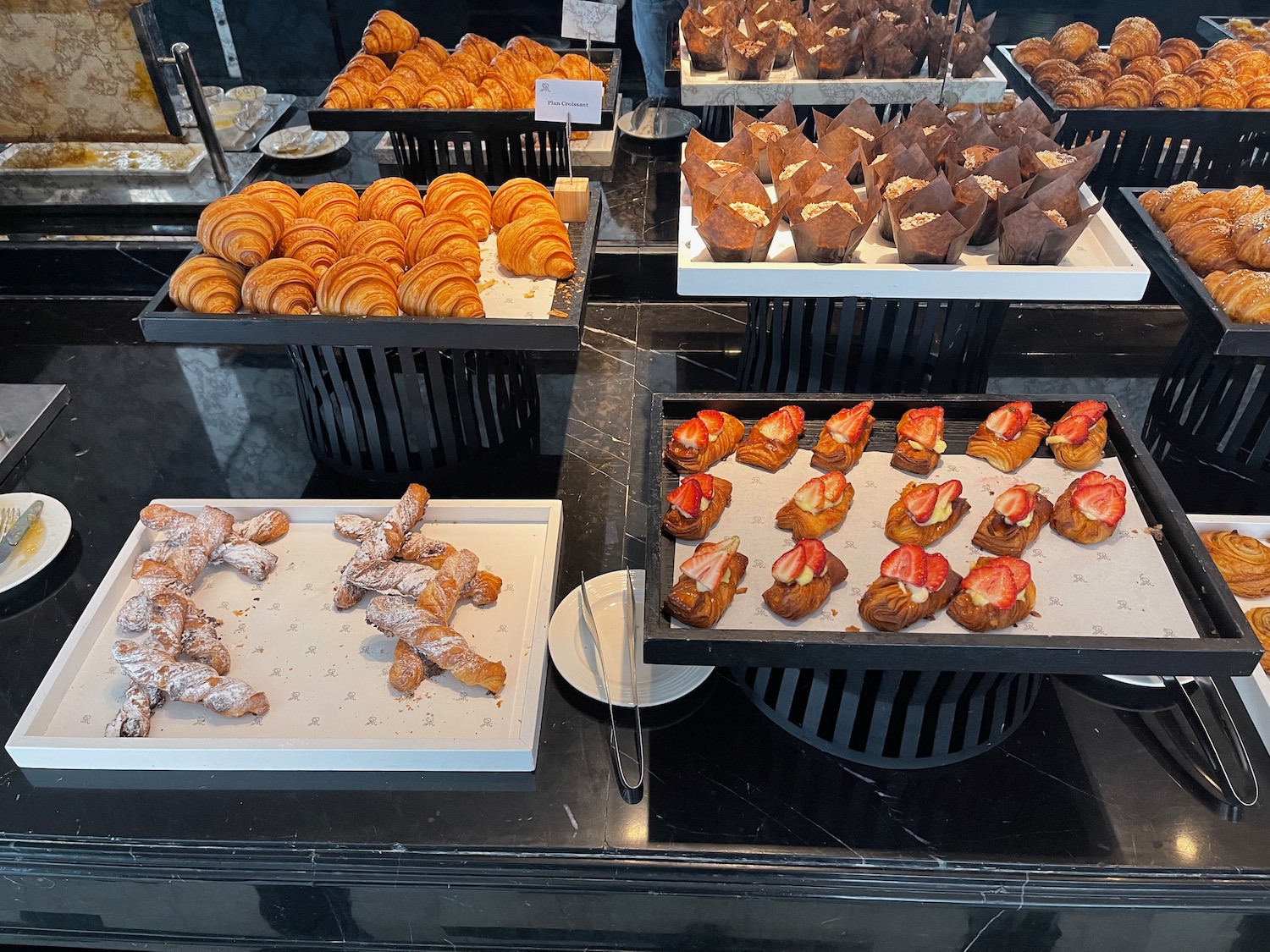 a trays of pastries and pastries on a table