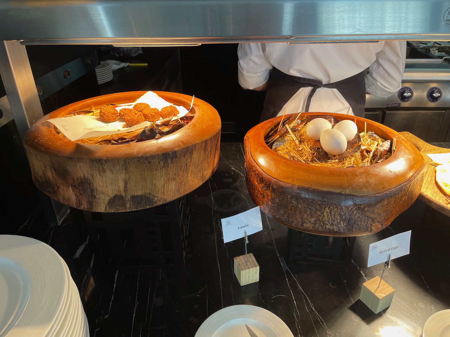 a group of bowls with food in them