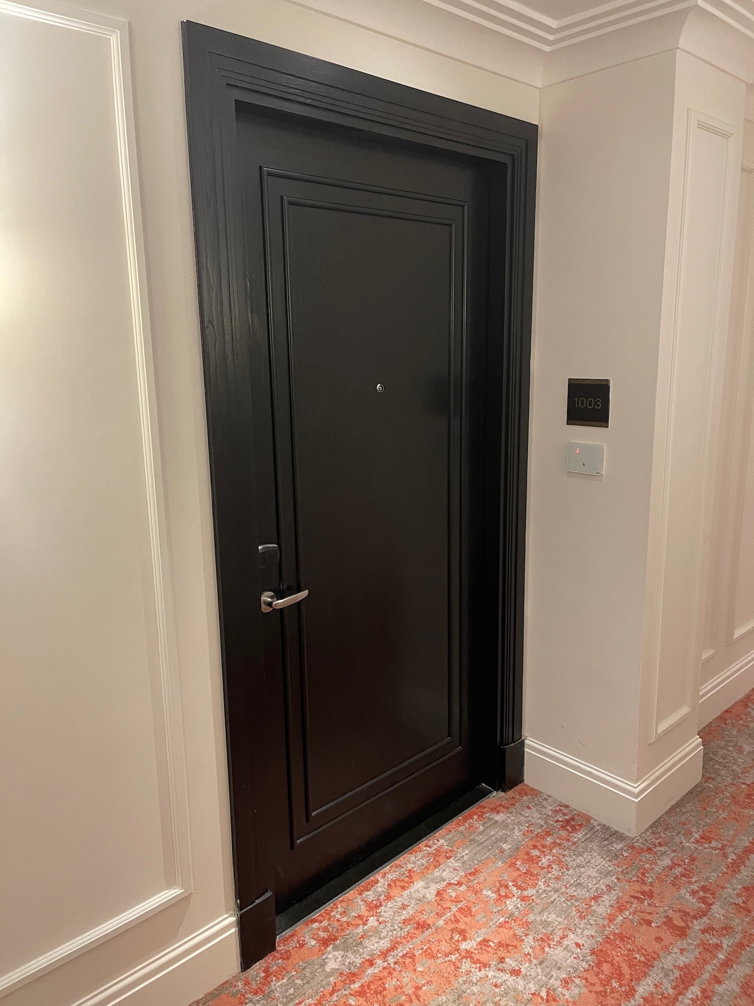 a black door in a room