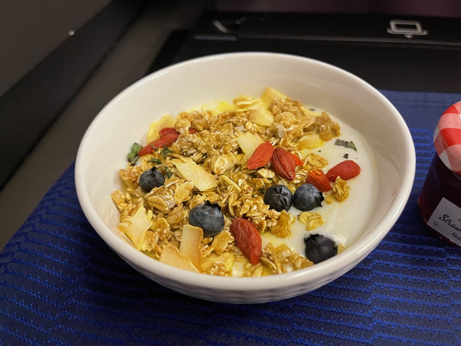 a bowl of cereal with fruit and milk