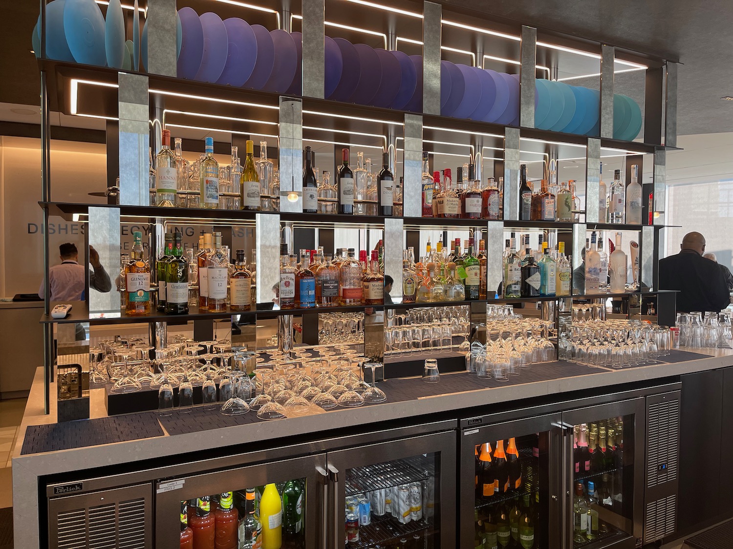 a bar with bottles of alcohol