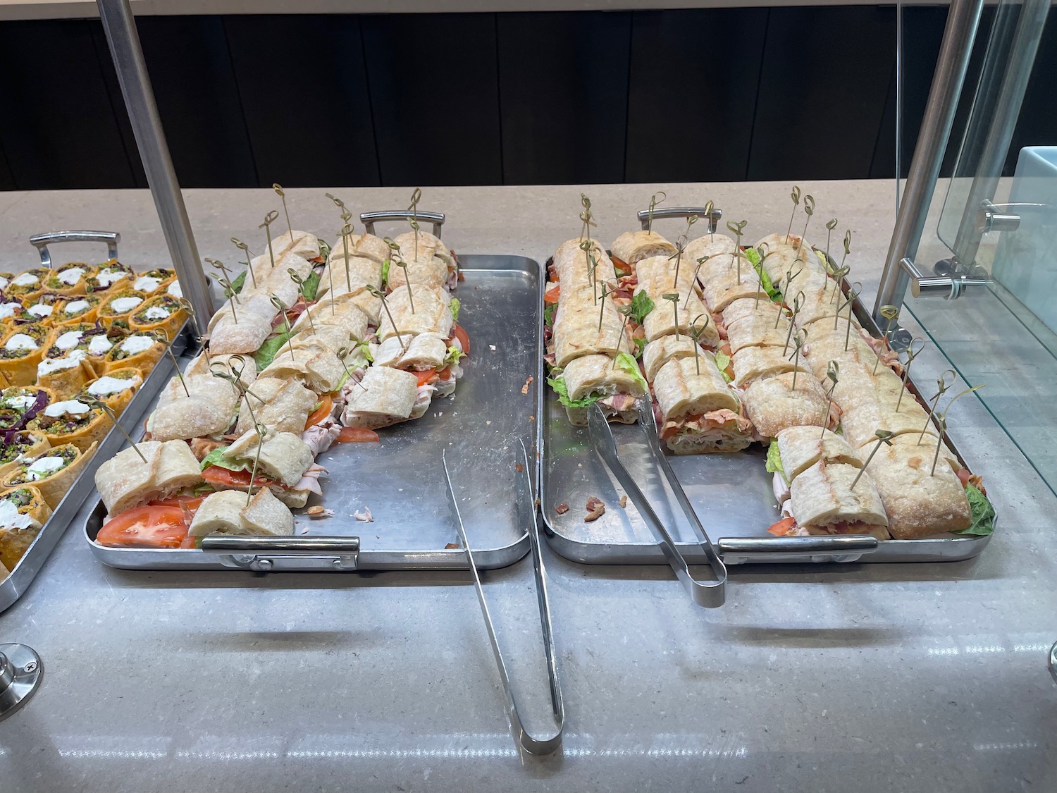 trays of sandwiches on a table