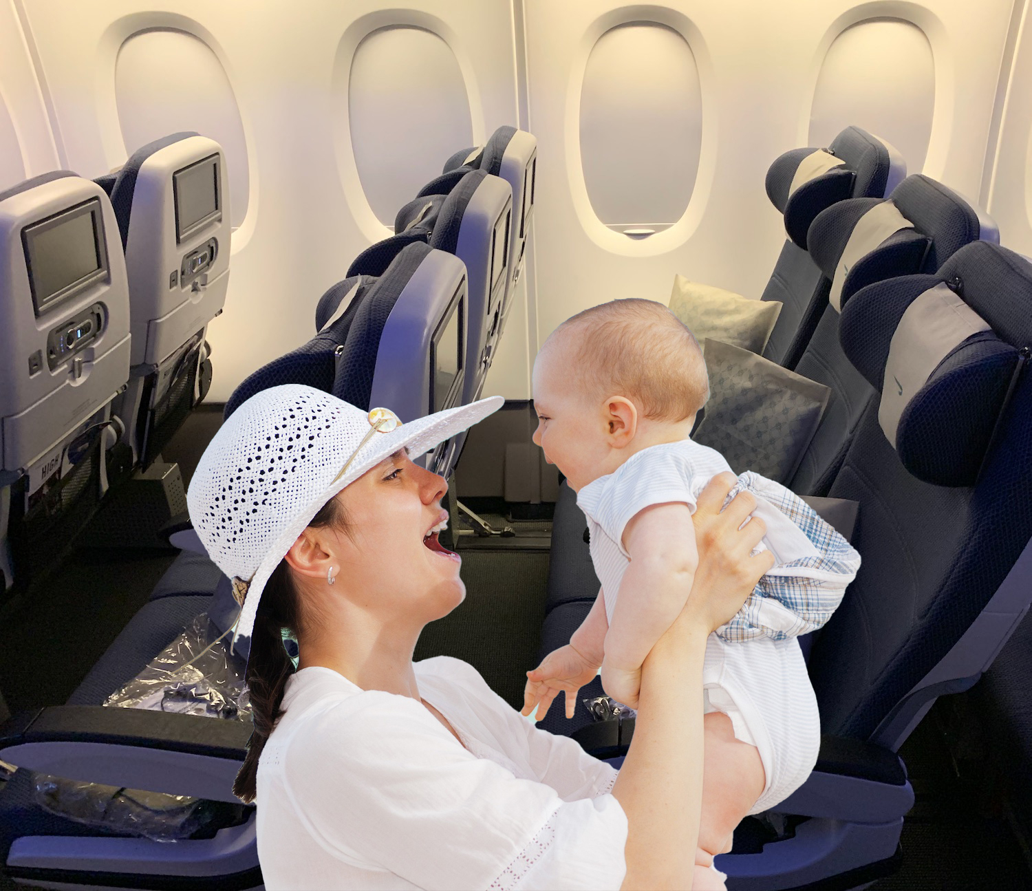 a woman holding a baby in an airplane