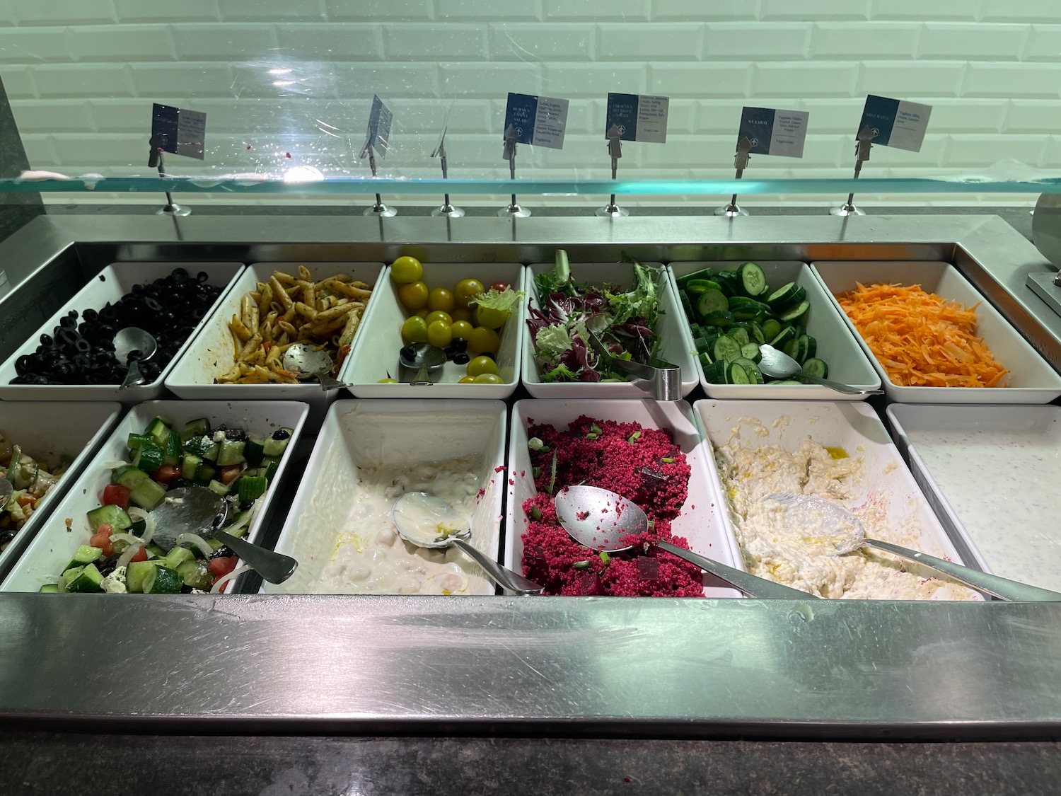 a salad bar with different types of food