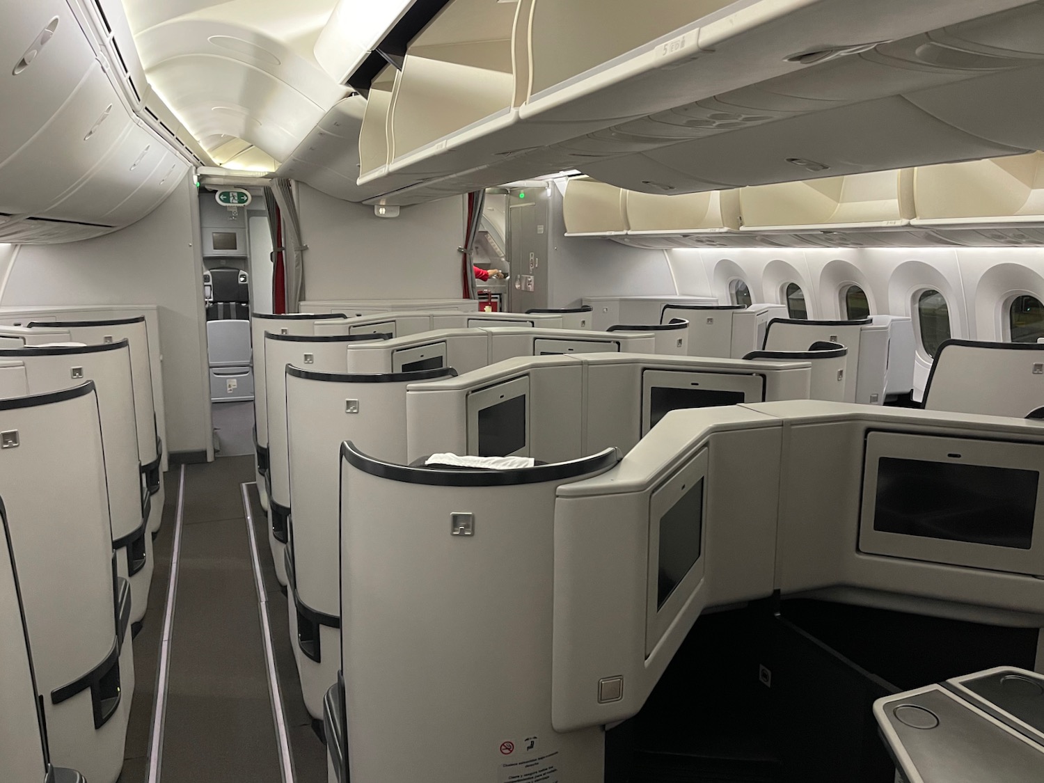 an airplane with rows of seats and windows