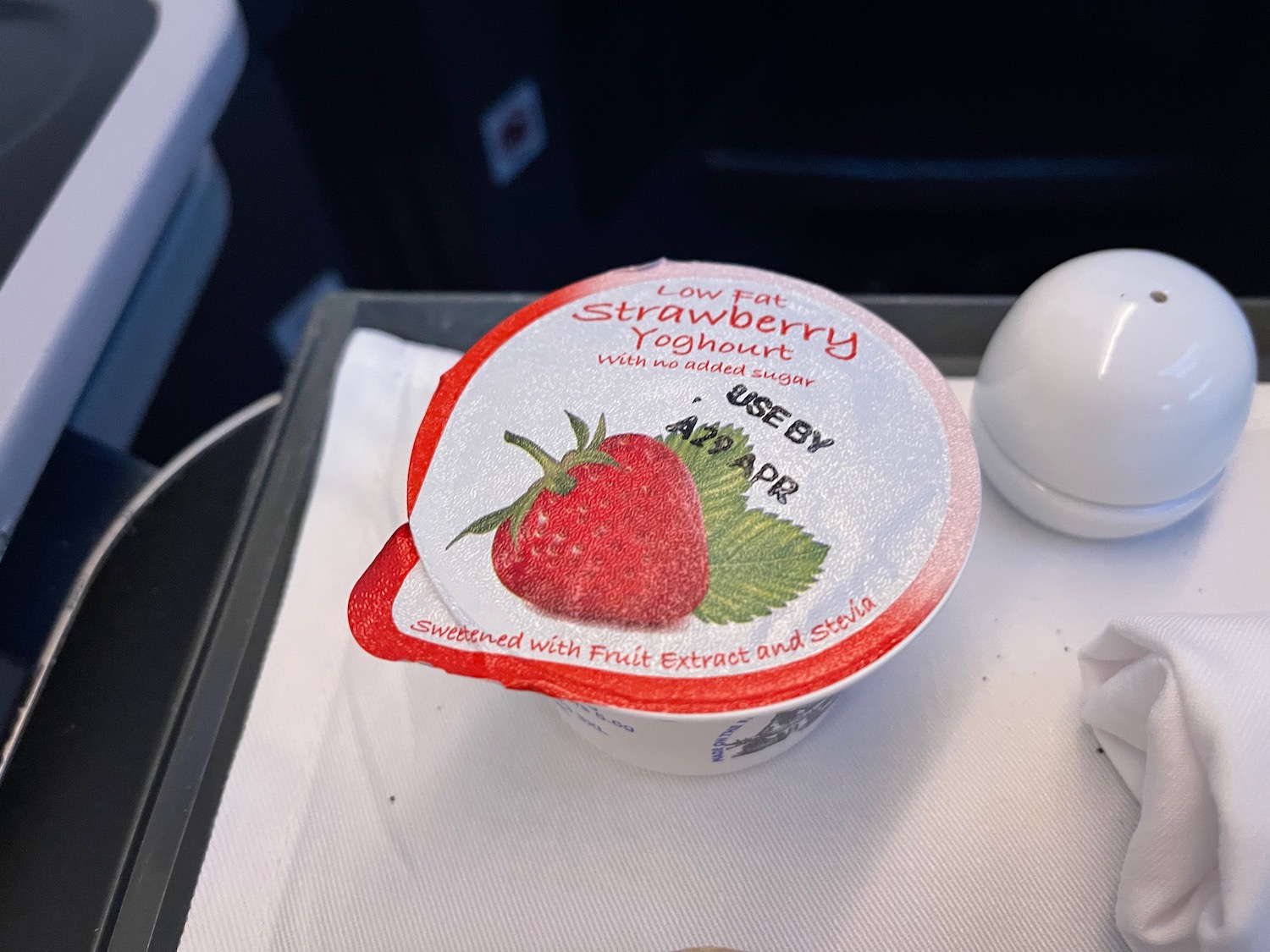 a container of yogurt on a tray