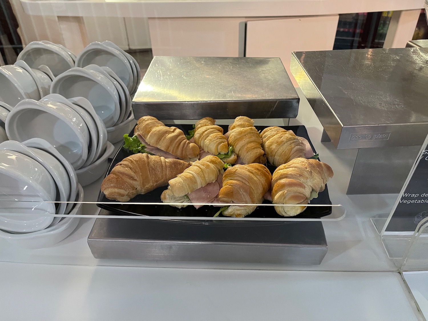 a plate of croissants on a counter