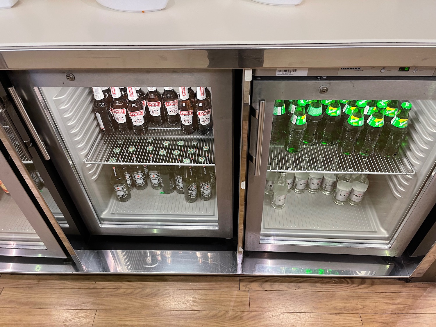 a refrigerator with bottles of beer