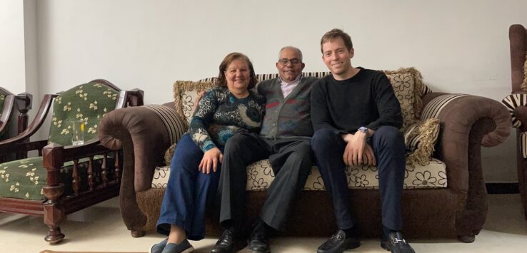 a group of people sitting on a couch