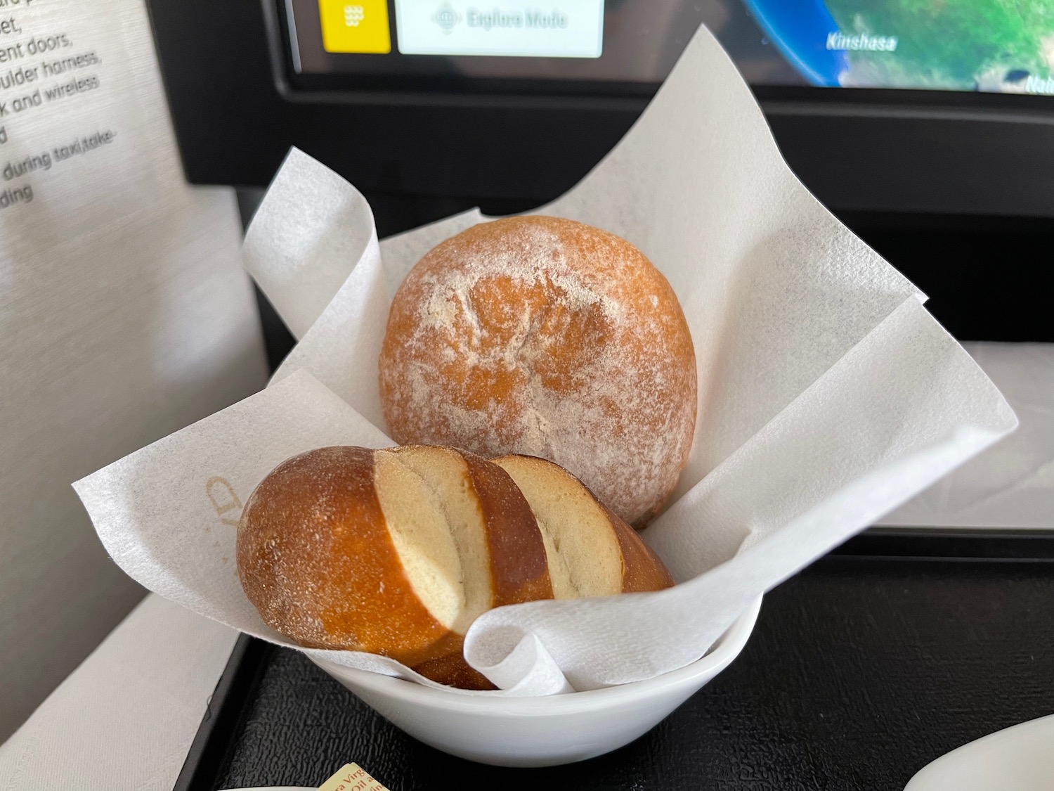 a bowl of bread and rolls