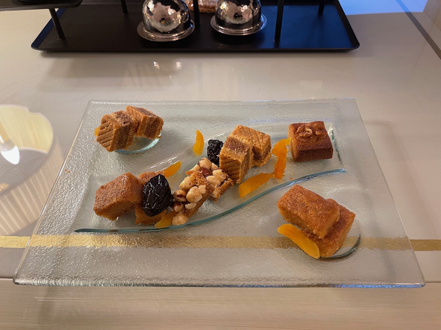 a plate of desserts on a table