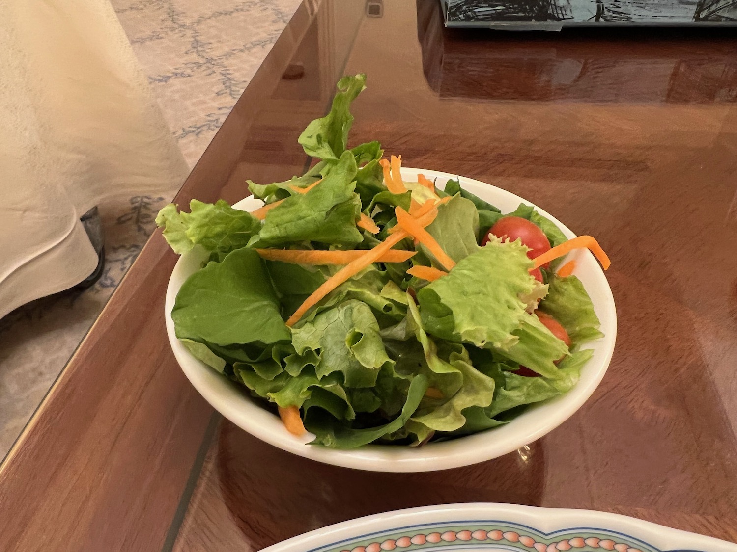 a bowl of salad on a table