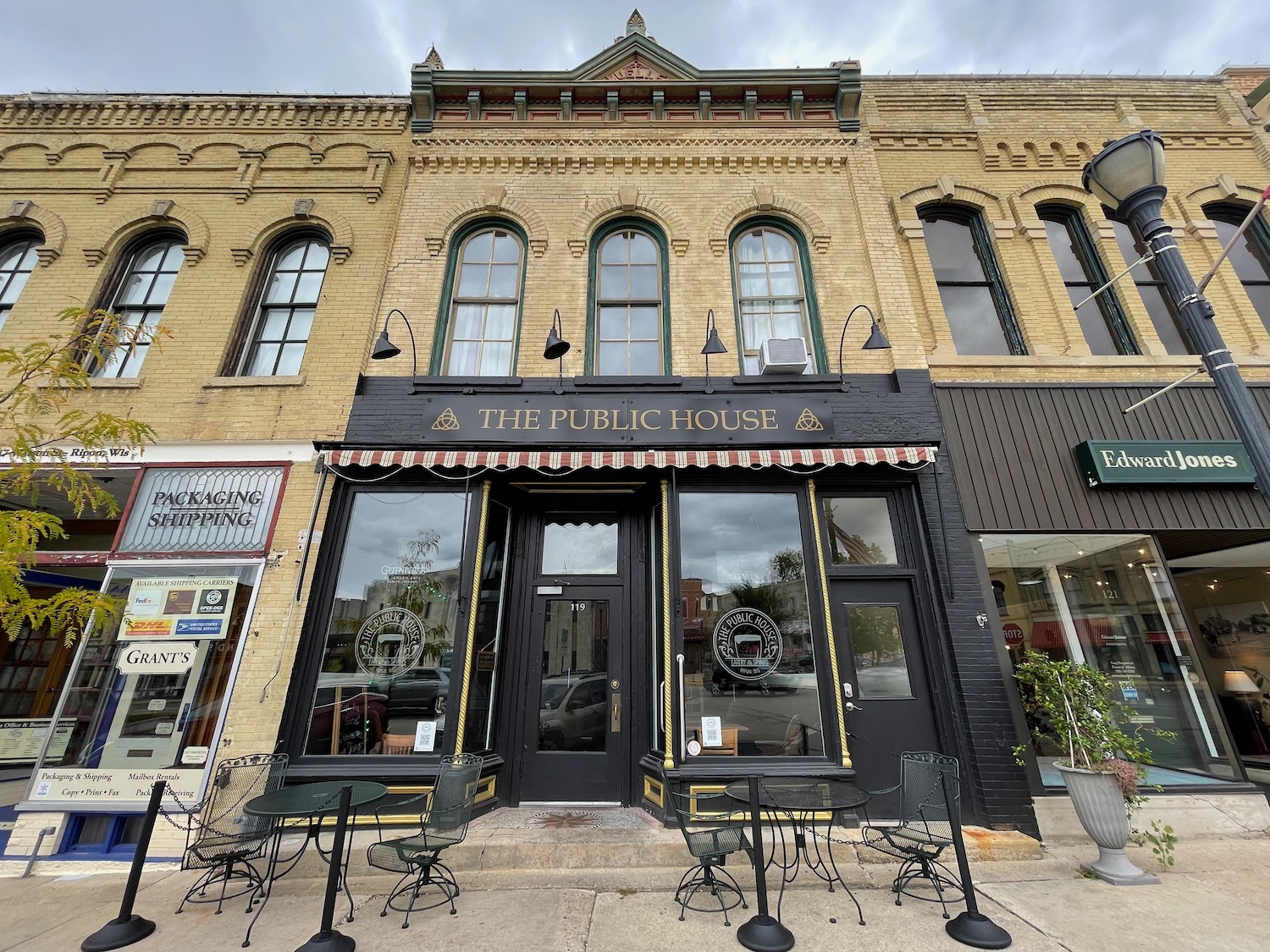 a building with tables and chairs