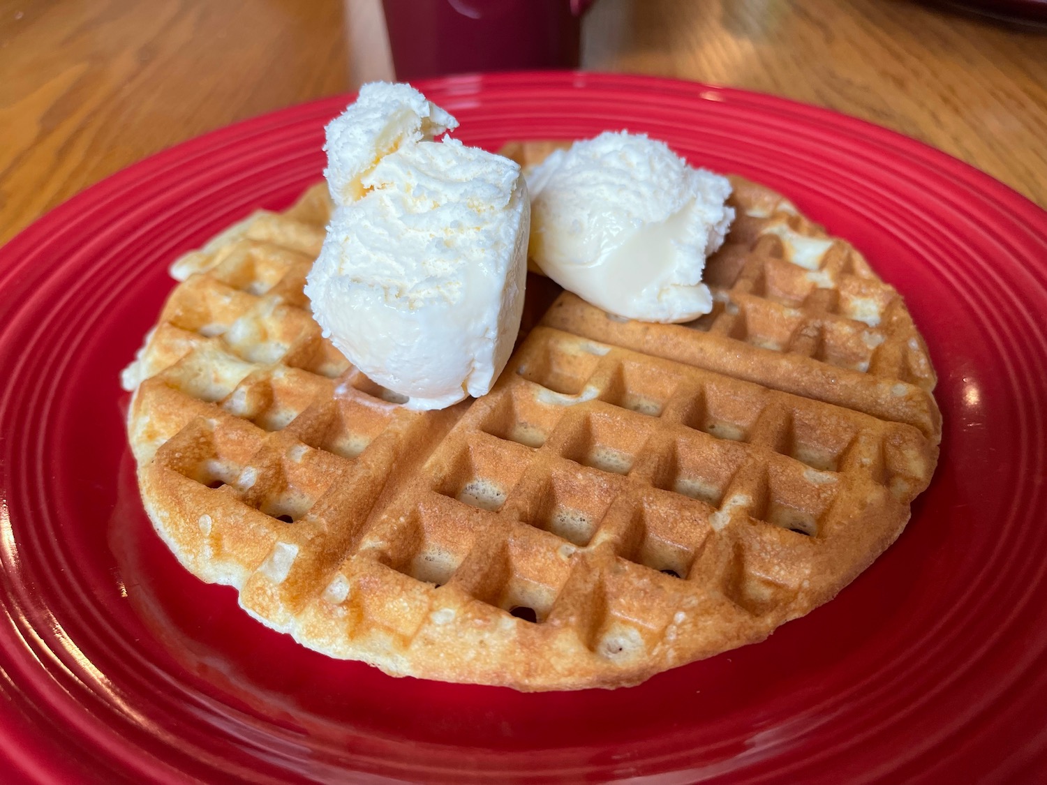 a waffle with ice cream on top