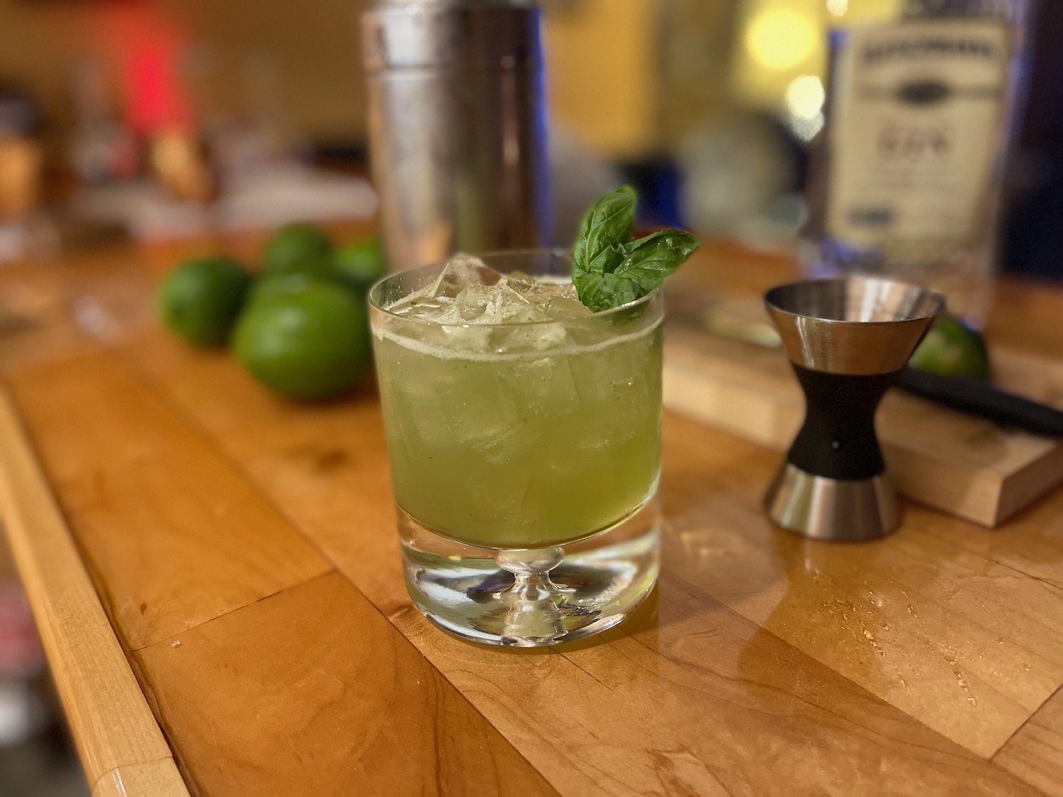 a glass of drink on a counter