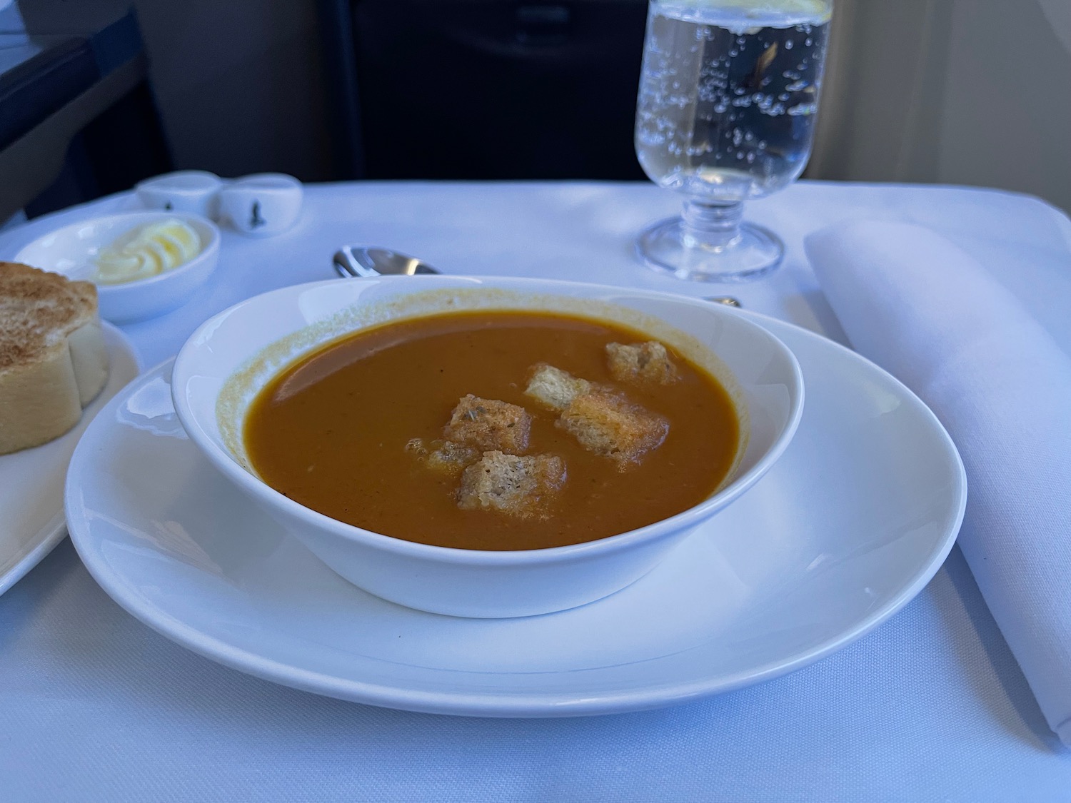 a bowl of soup on a plate