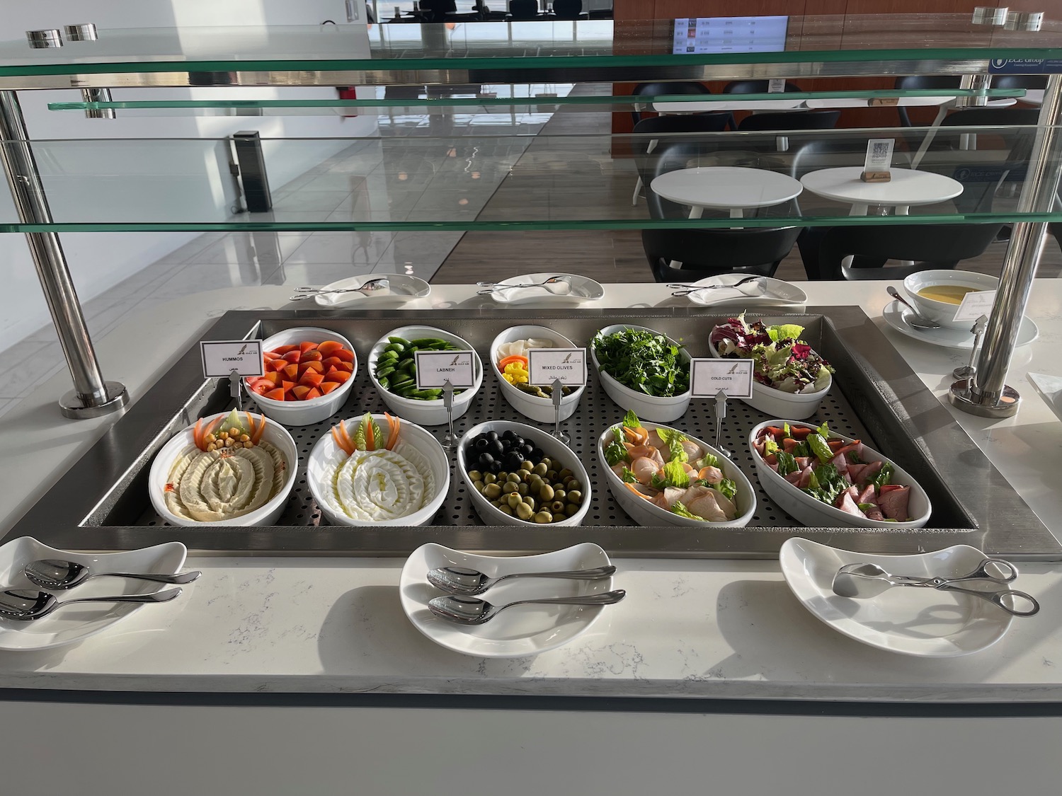 a buffet with different food items on it