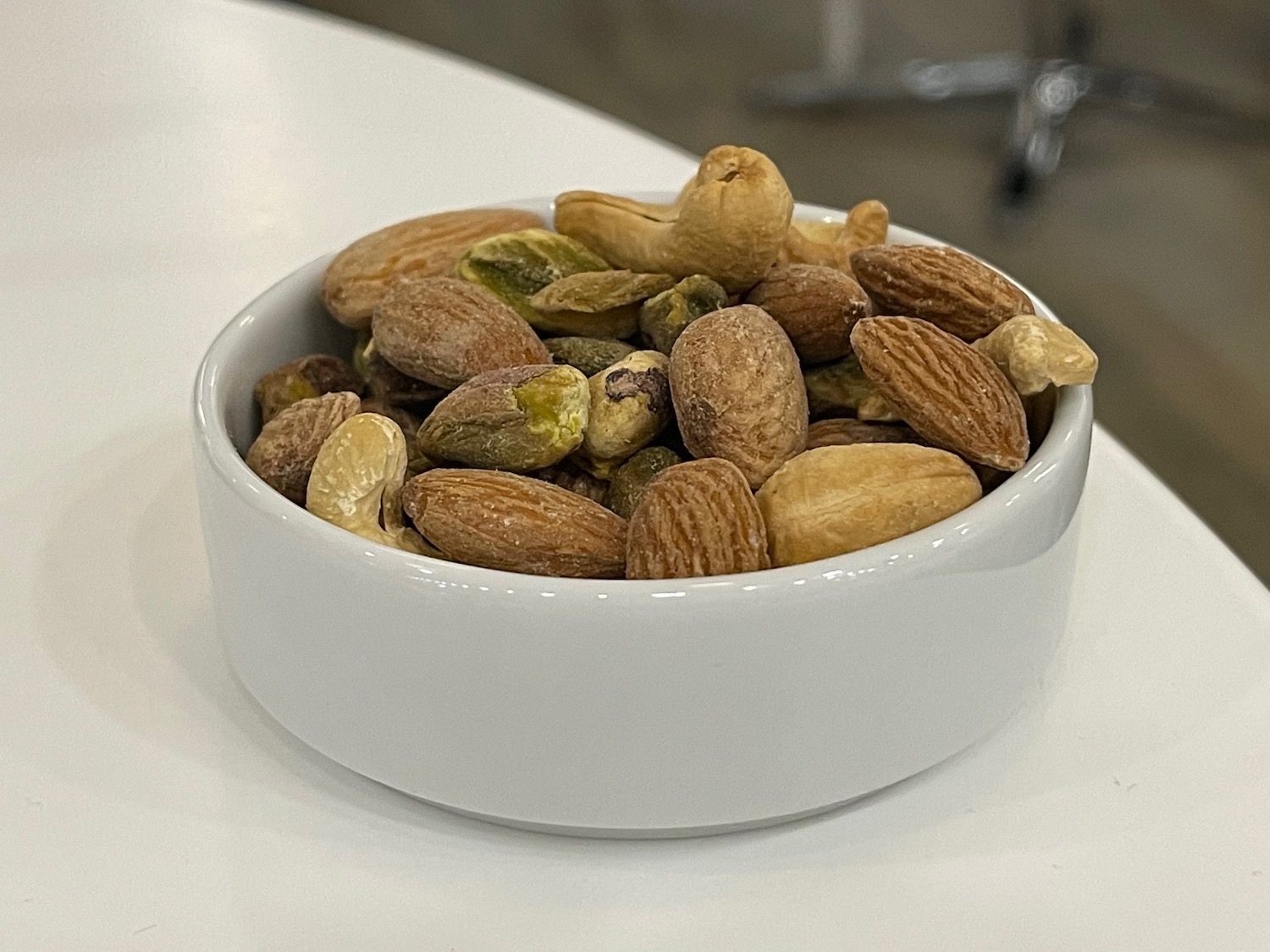 a bowl of nuts on a table