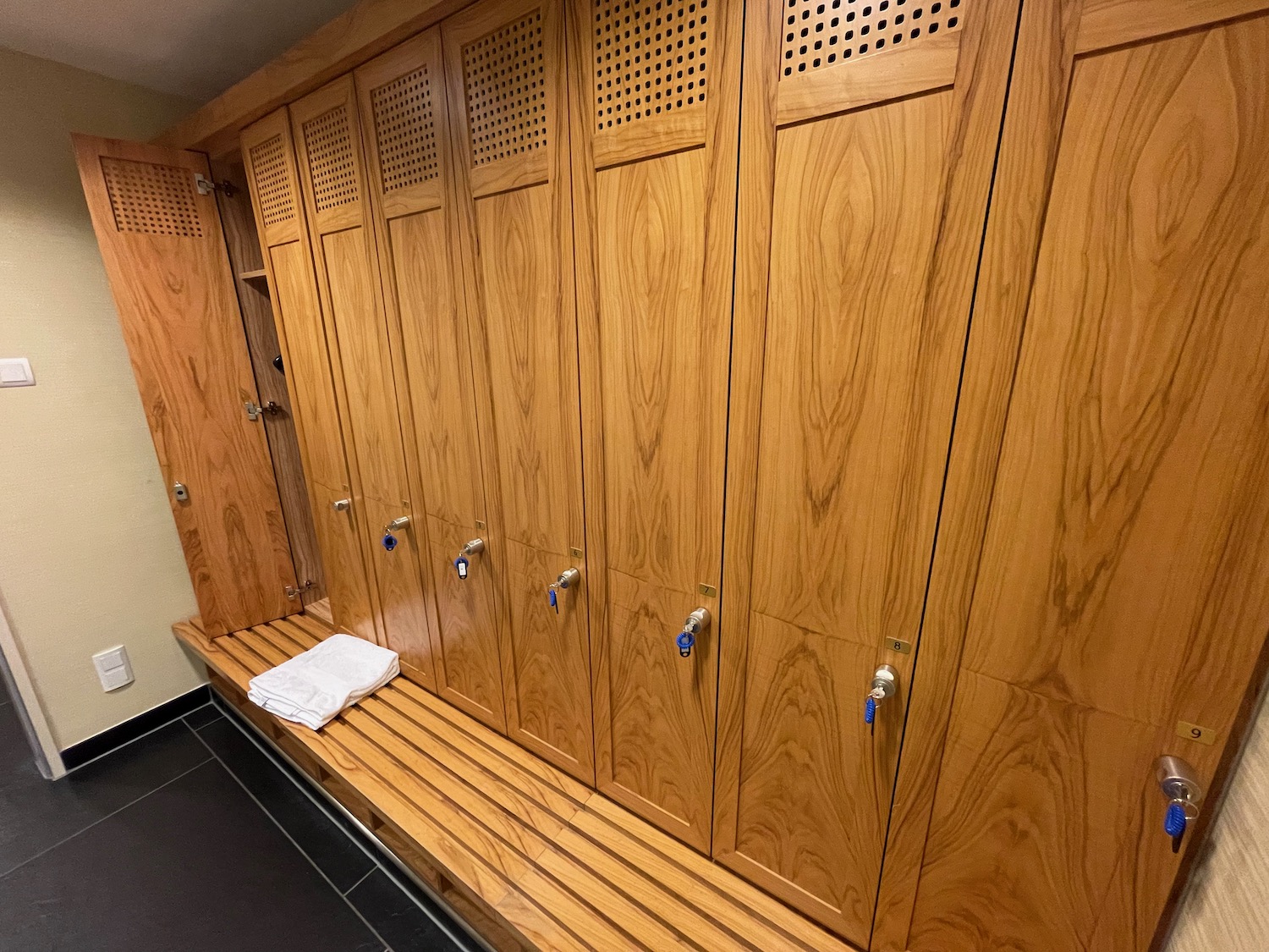 a wooden lockers in a locker room