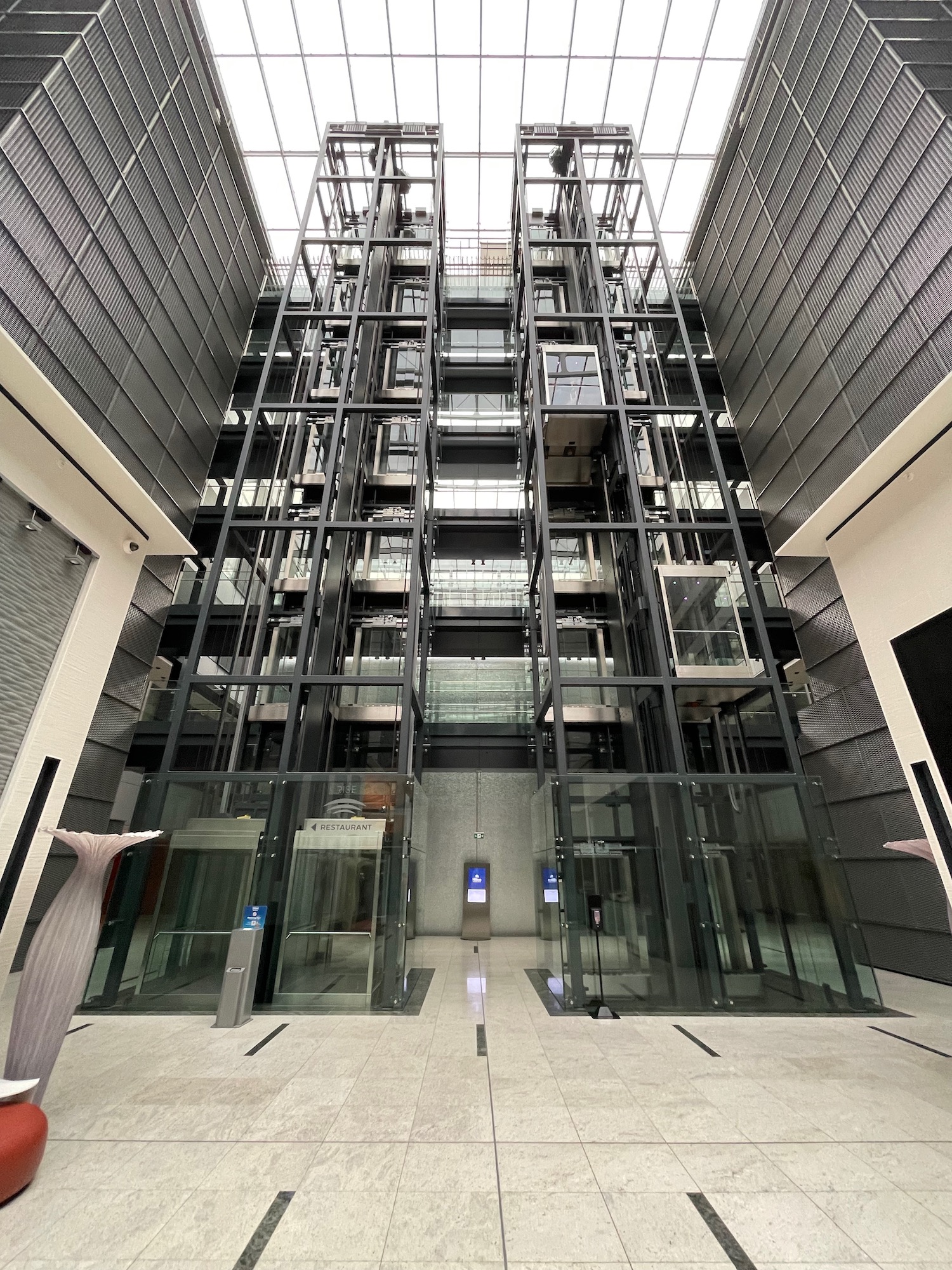 a glass elevator in a building