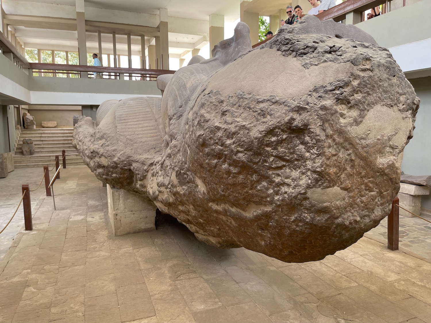 a large stone statue in a building