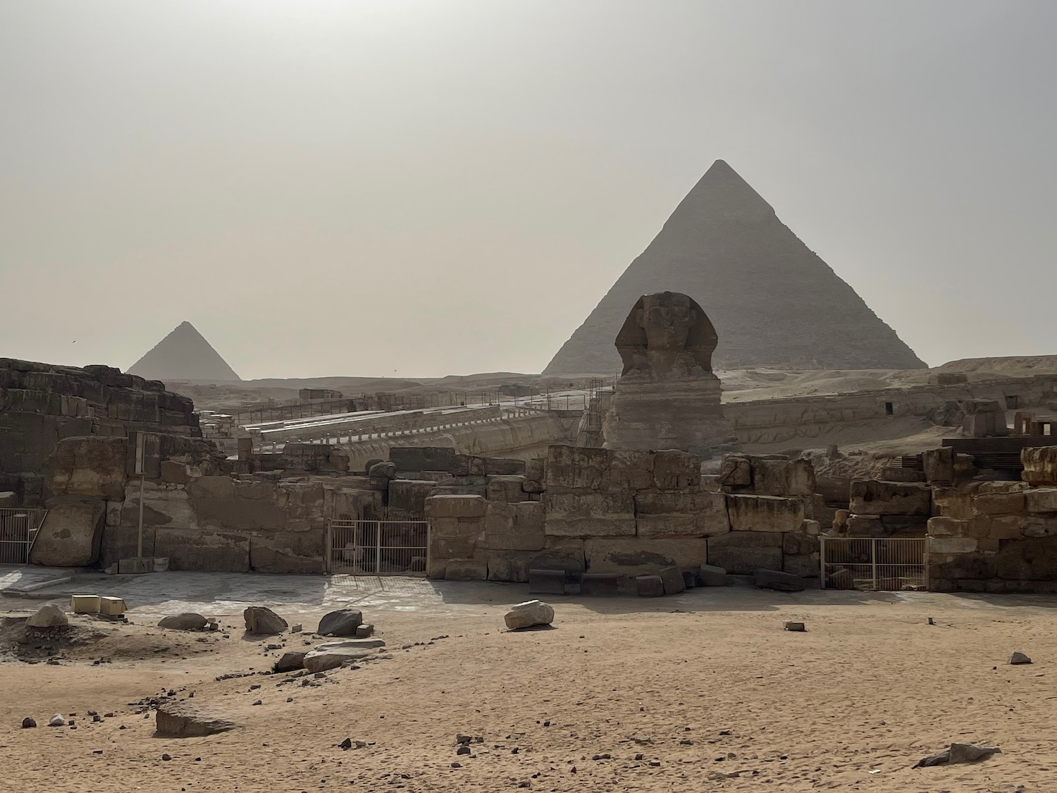 a group of pyramids in the desert