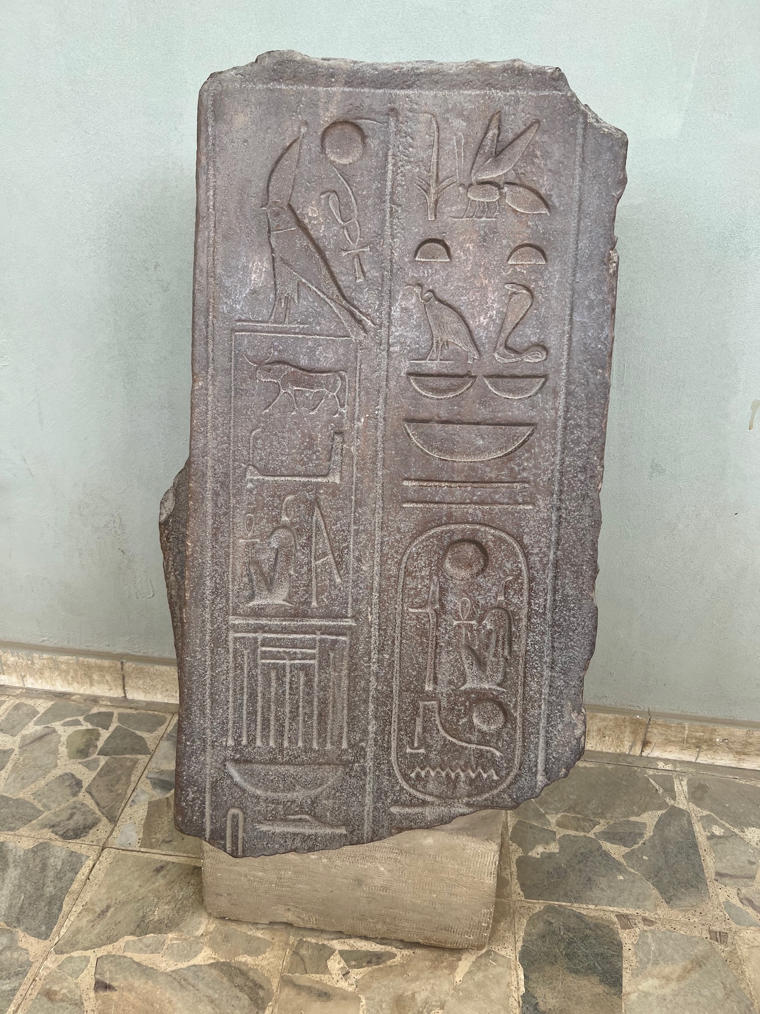 a stone with egyptian symbols