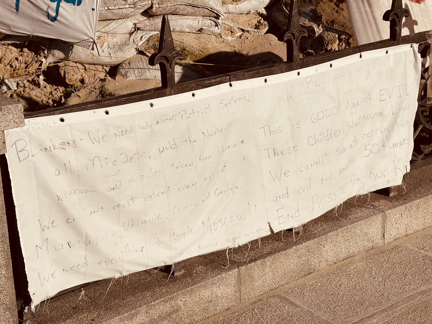 a white banner with writing on it