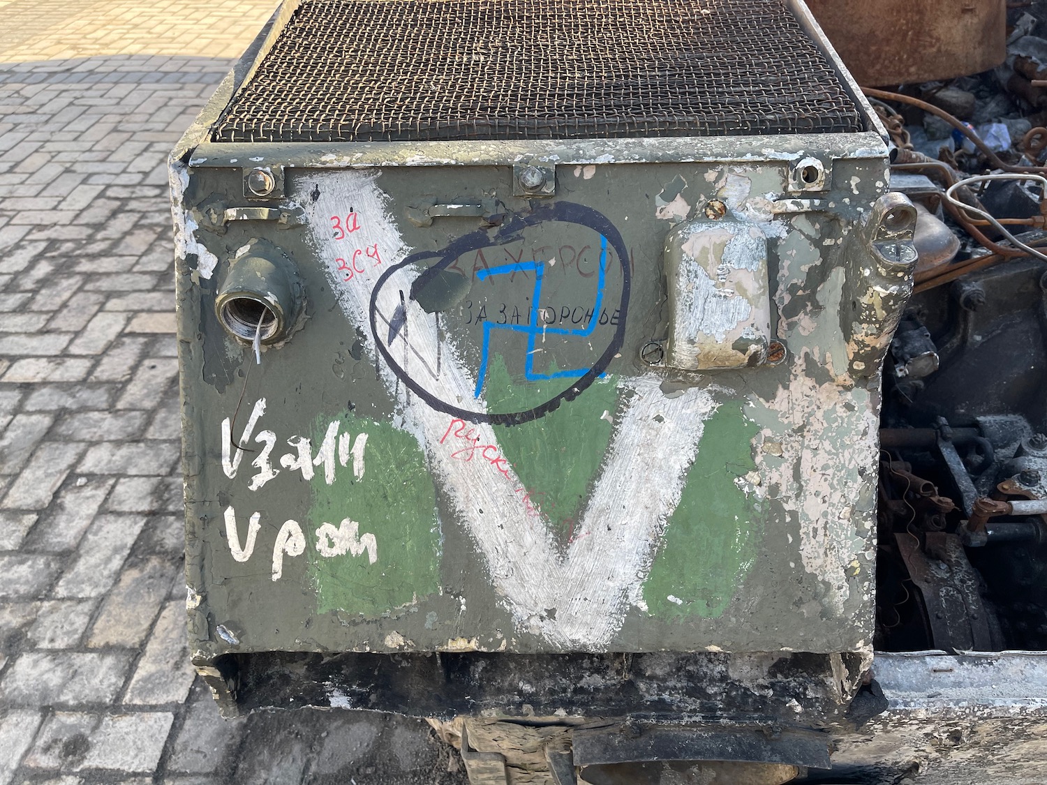 a metal box with graffiti on it