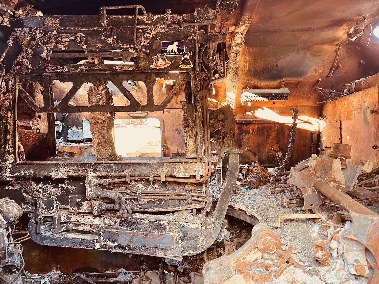 a burned out machine in a room