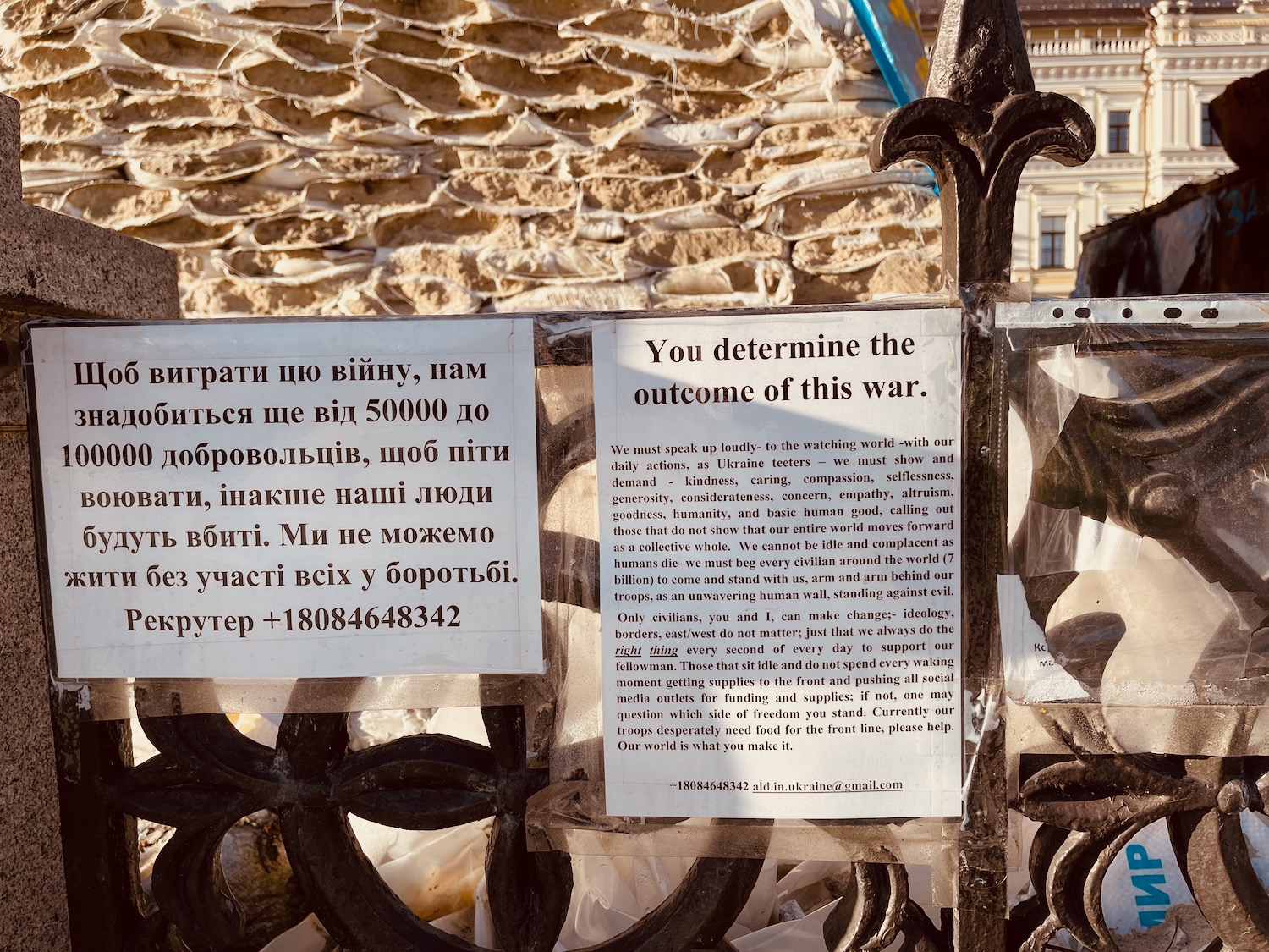 a sign on a fence