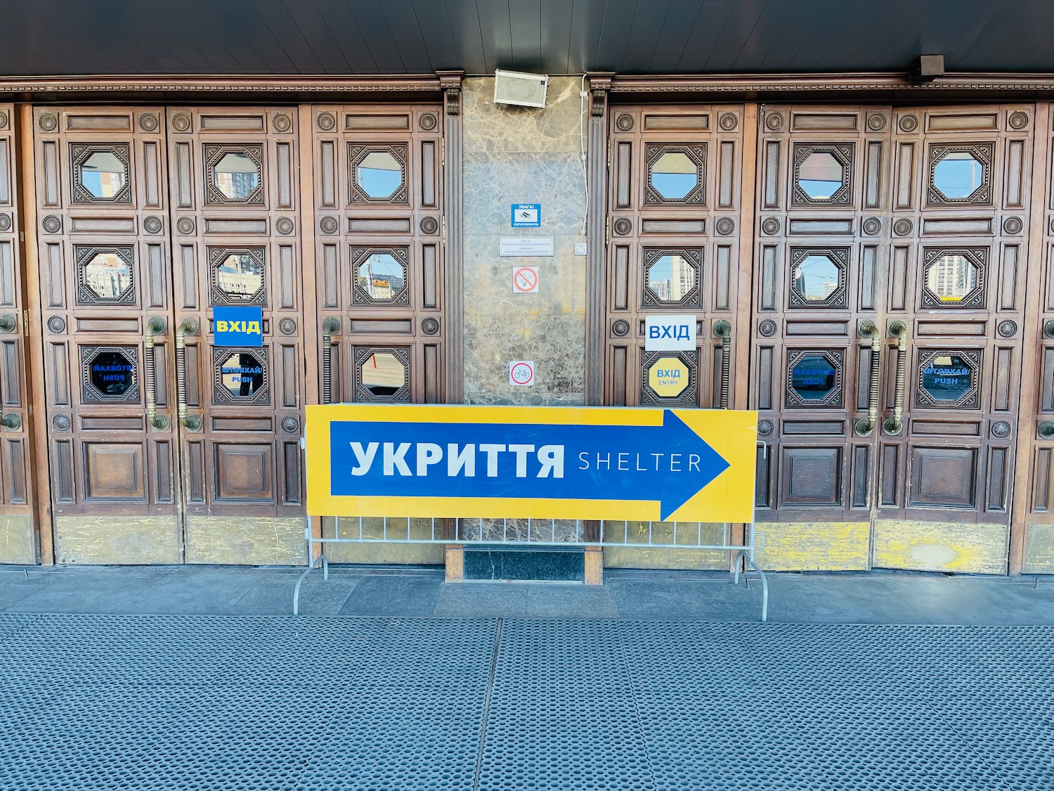 a sign in front of a building