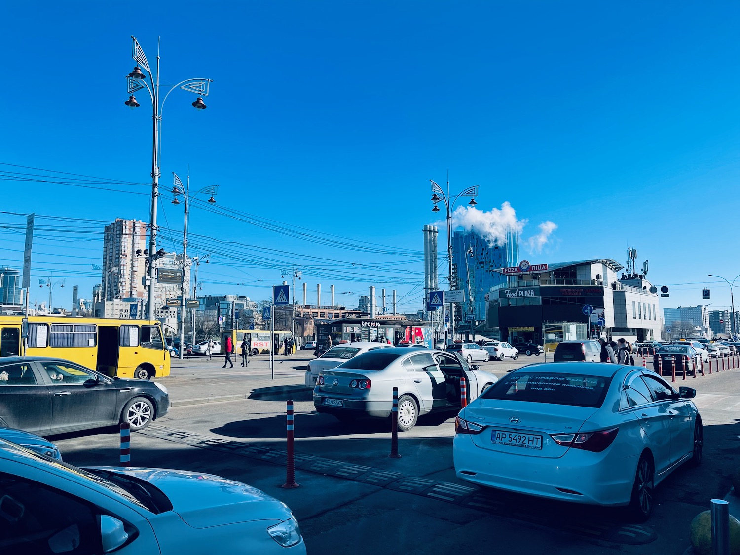 a group of cars parked in a parking lot