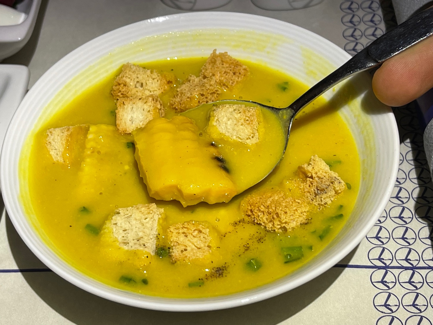 a bowl of soup with a spoon