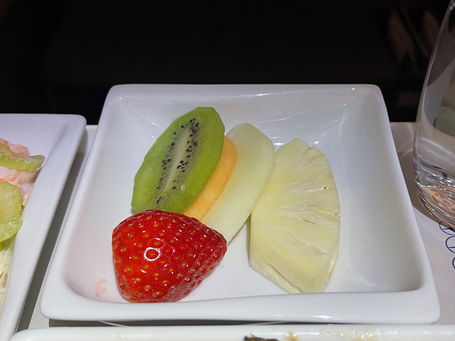 a plate of fruit on a tray