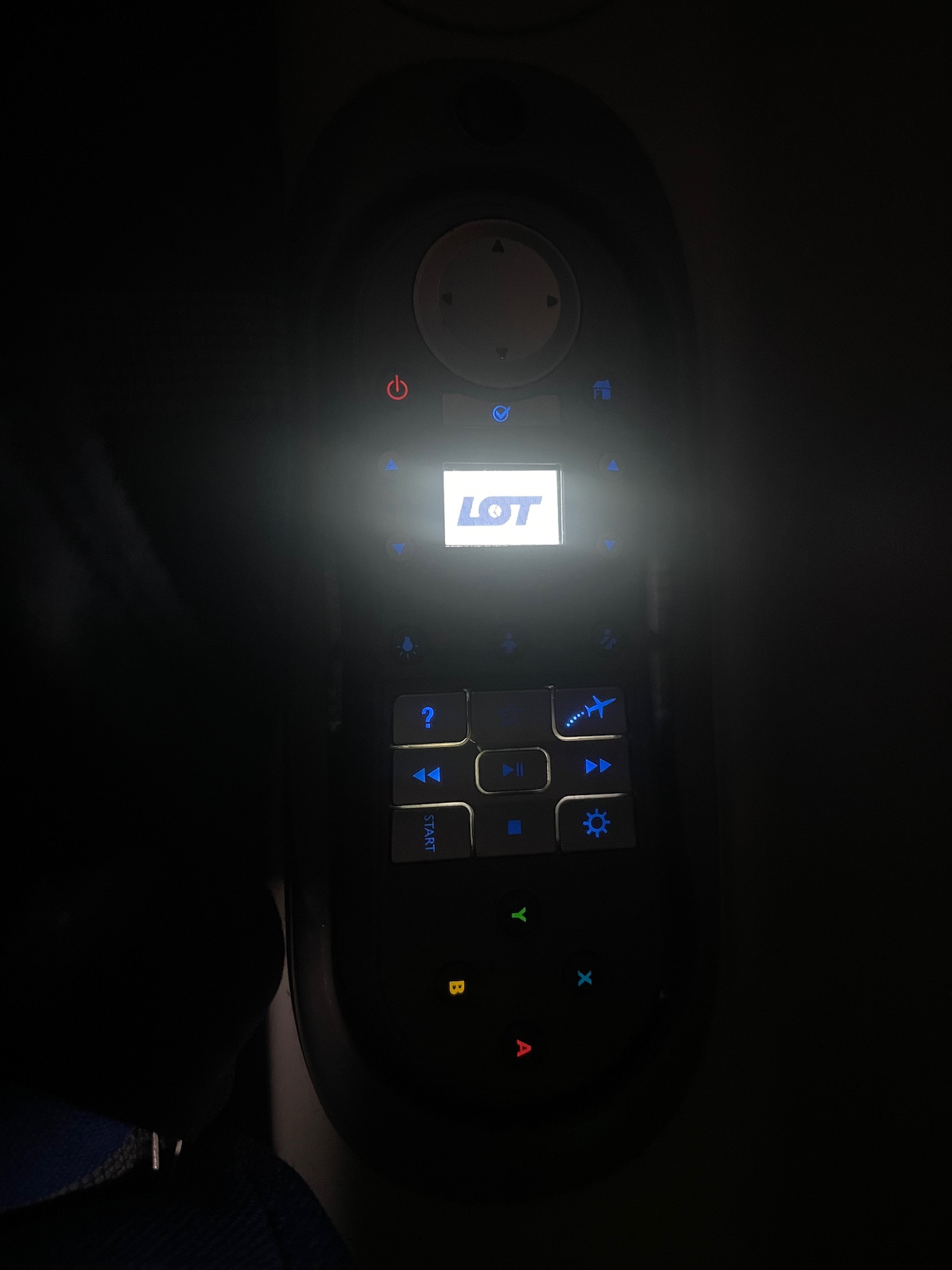 a remote control with a light on