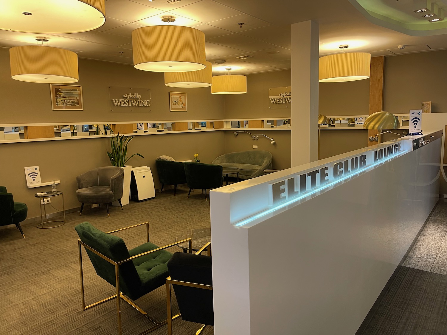 a reception area with chairs and a desk