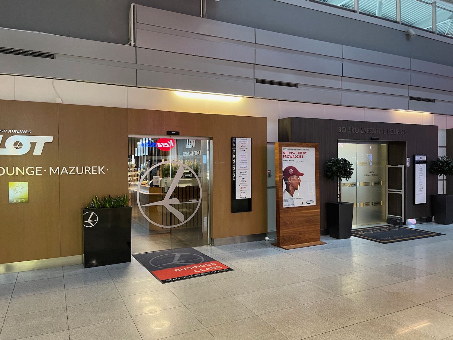 a building with a glass door and a sign