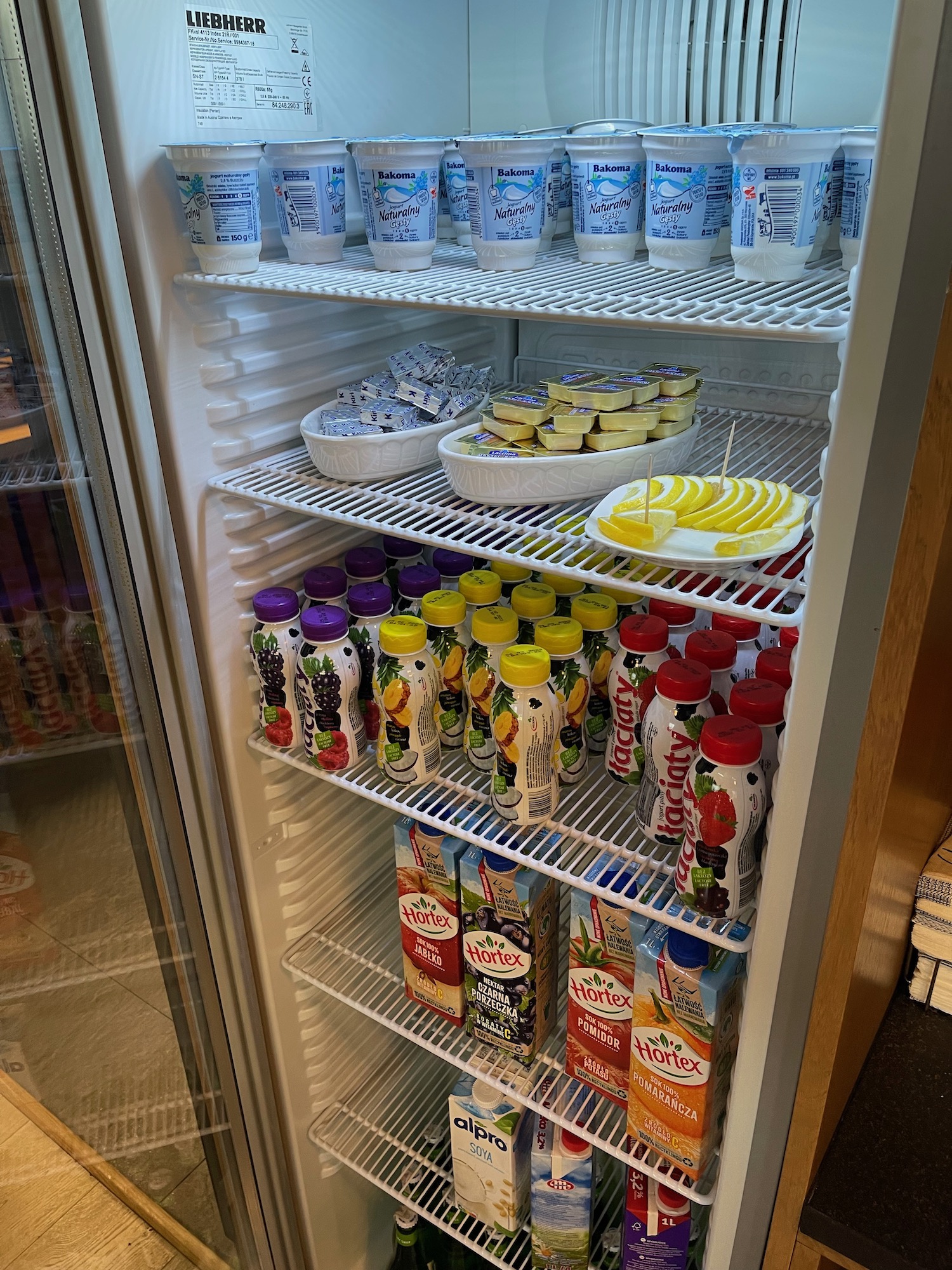 a refrigerator full of yogurt and fruit