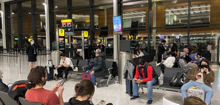 a group of people sitting in a waiting area