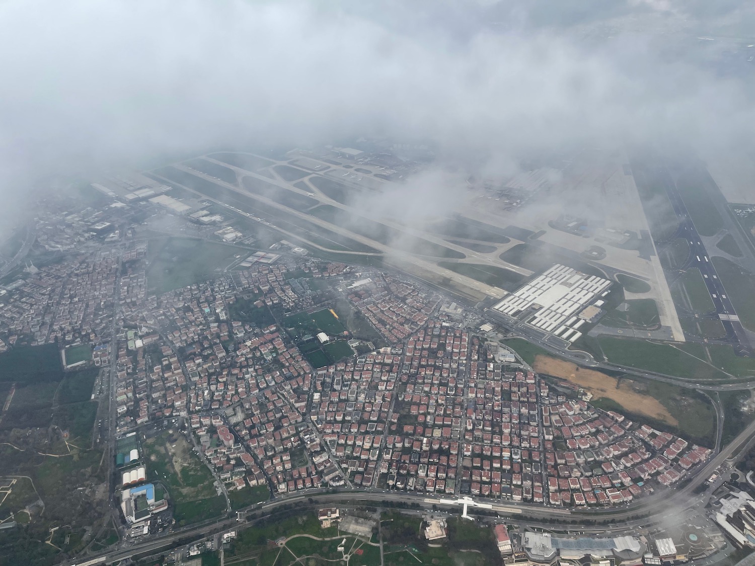 aerial view of a city with roads and buildings