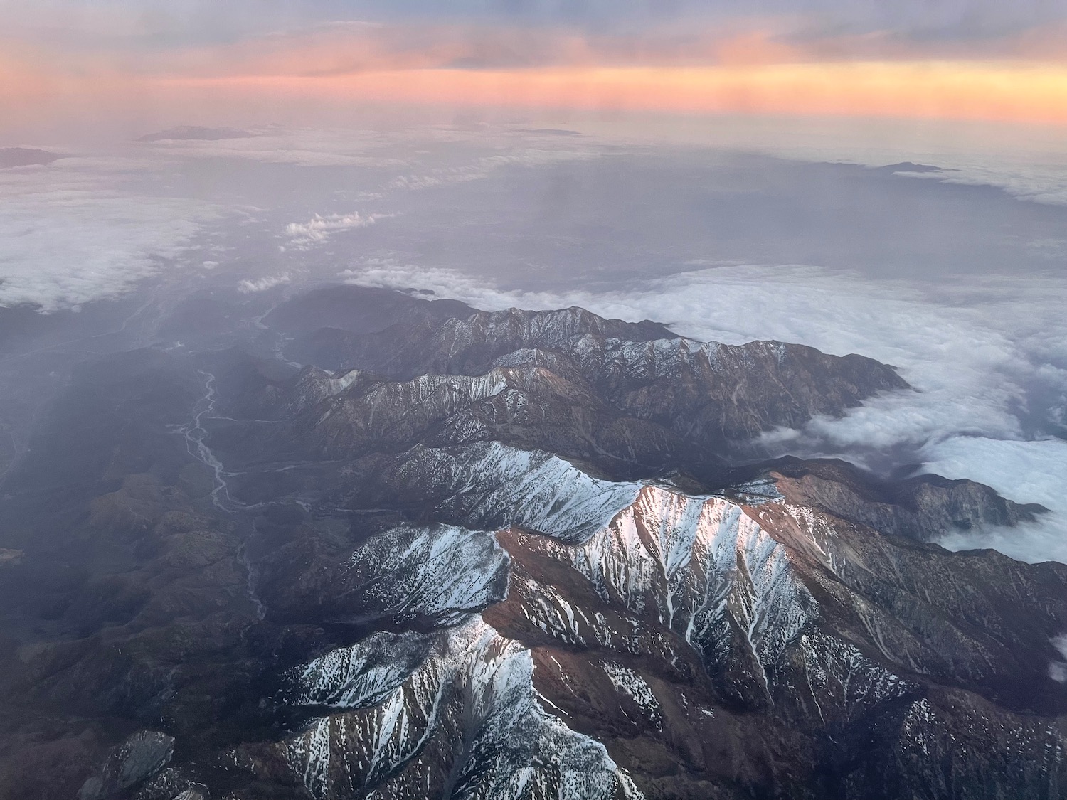 a mountain range with snow