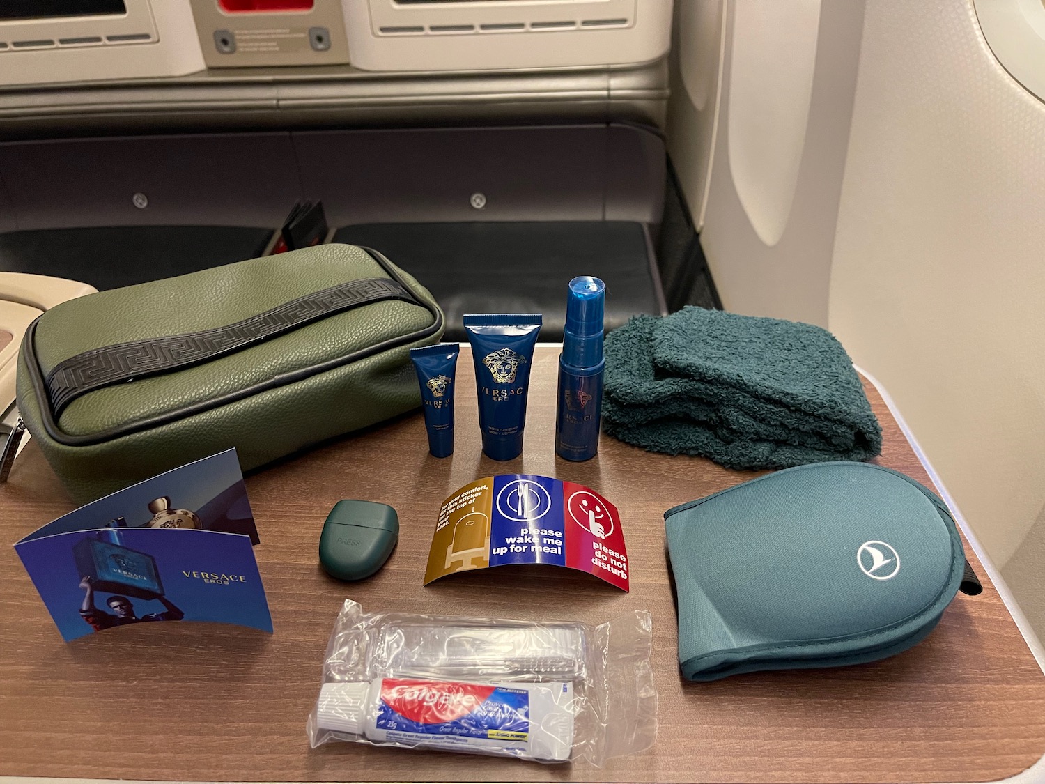 a table with a bag and items on it