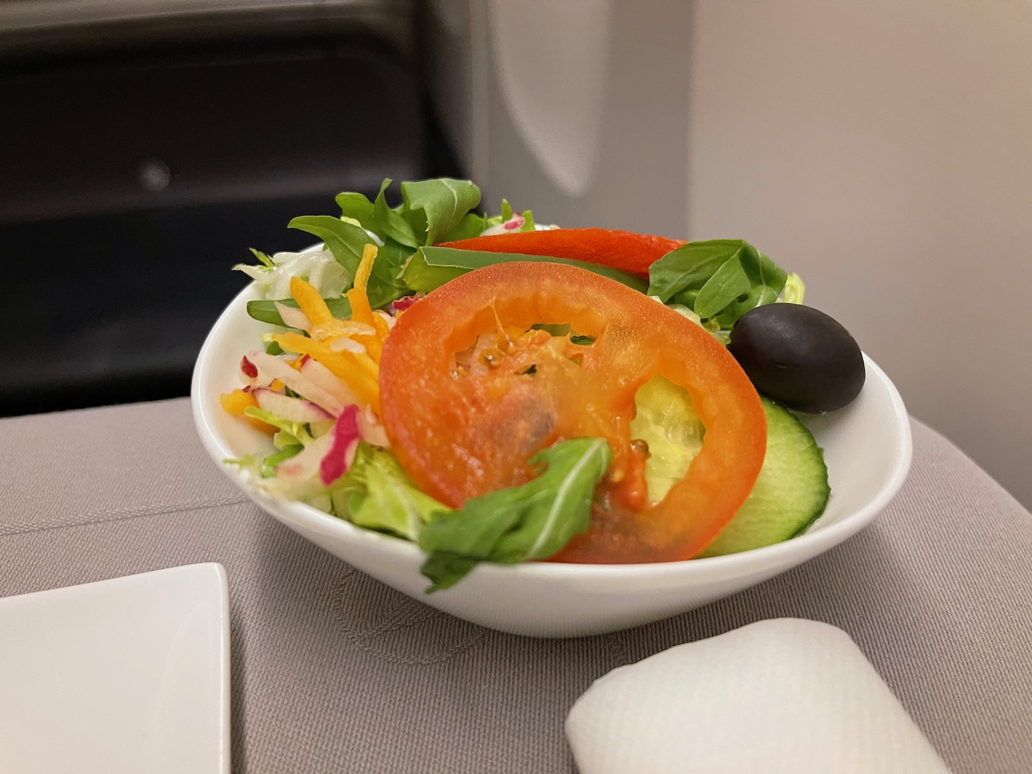 a bowl of salad on a table