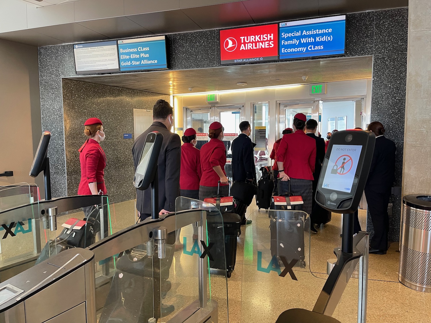 a group of people in red uniforms